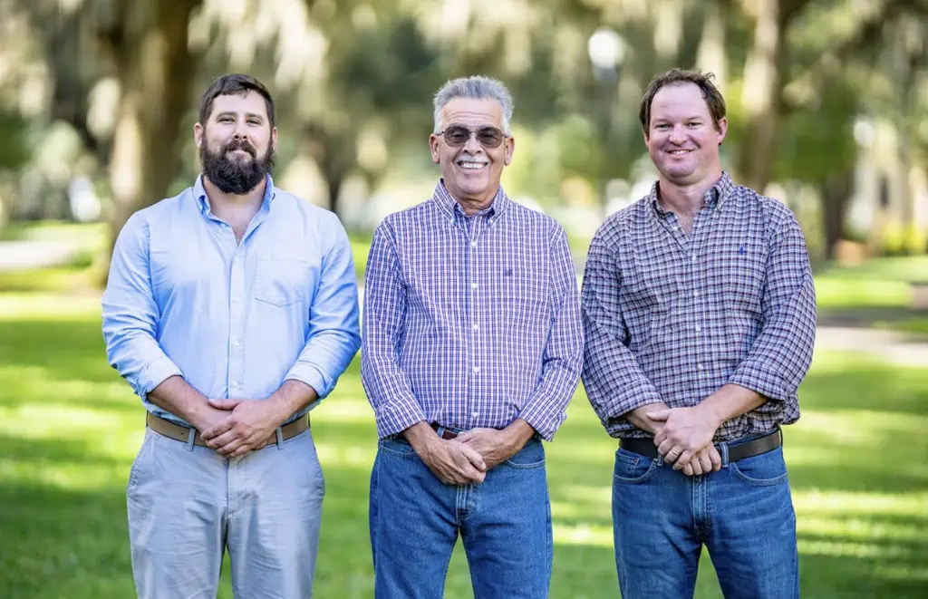  Tony Greco and Graham Jones, current co-owners of Leisure Pools Beaufort, together with their father-in-law Jerry Sutcliffe.